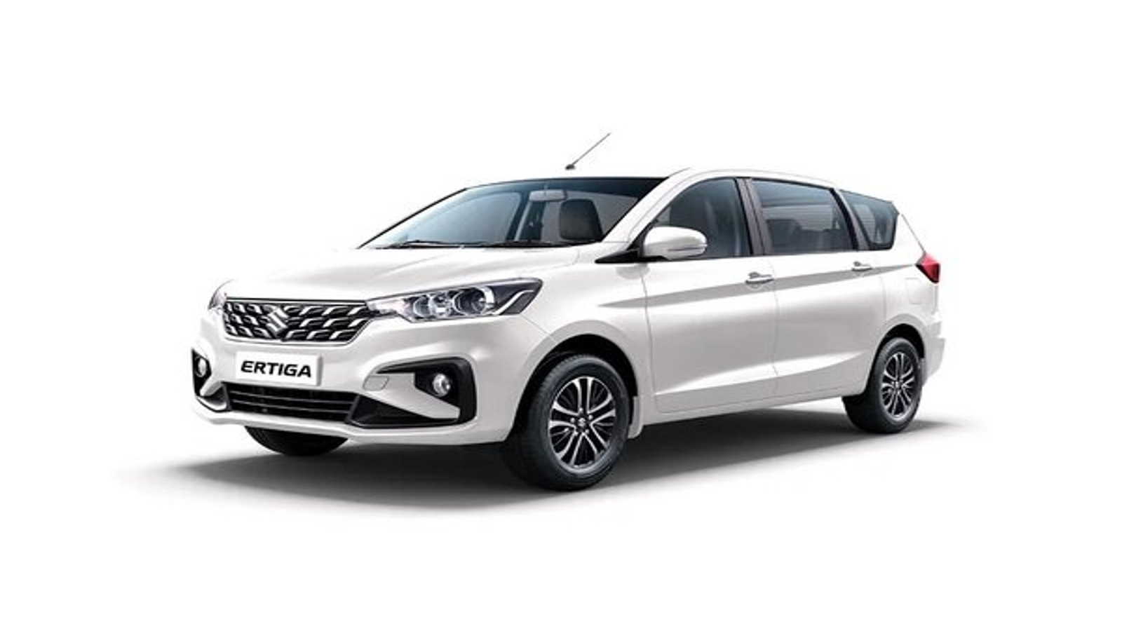Pearl white Maruti Suzuki Ertiga 7-seater MPV — QuickAura Travels cab